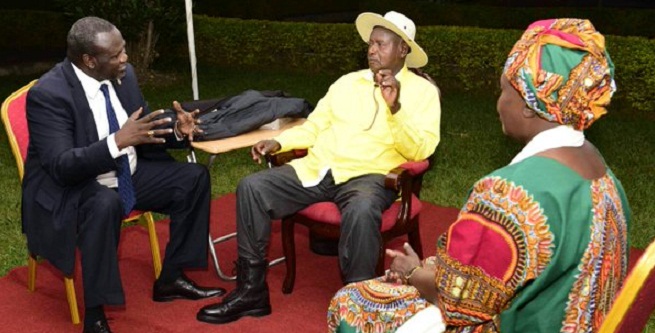 Museveni and Machar at a recent meeting. Machar has agreed to return to Juba. FILE PHOTO