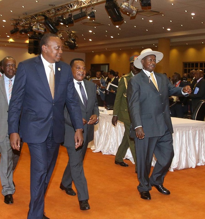 Museveni welcomes Kenyatta to the summit. Kenya and Tanzania left the summit happy.