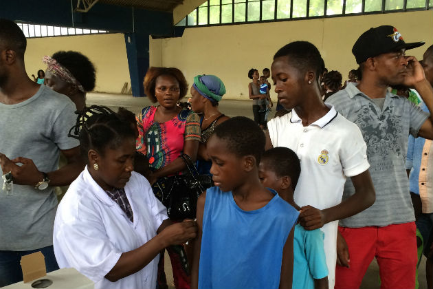 Boys get vaccination as Angola struggles to control a yellow fever outbreak. WHO PHOTO