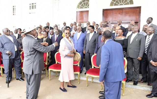 Museveni talks to colleagues in cabinet Wednesday. PHOTOS BY PPU