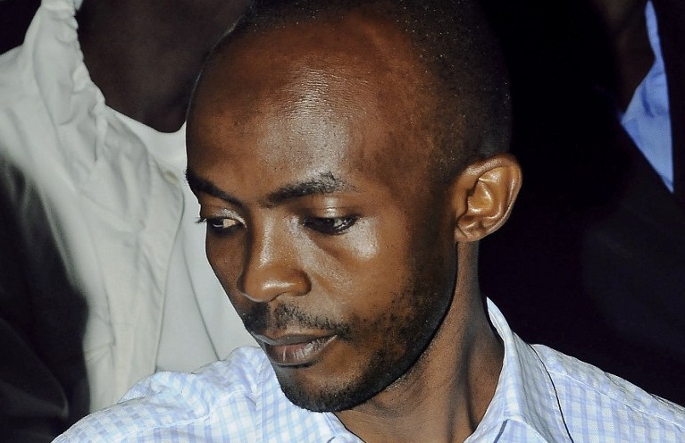 Kampala 2010 World Cup bombing suspect, Issa Luyima, who was considered the mastermind behind the attacks, sits in Kampala High Court, on May 27, 2016. Luyima was sentenced to life in prison for the twin bombings which targeted football fans in Kampala and killed 76 people. Four accomplices also received life terms for the 2010 suicide attacks, while two others received 50-year sentences. The attacks claimed by Somalia's Shebab jihadist group. / AFP PHOTO / RONALD KABUUBI