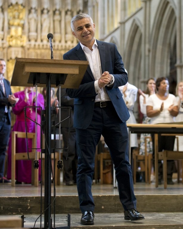 Britain's incoming London Mayor Sadiq Khan reacts during his swearing-in ceremony at Southwark Cathedral in cental London on May 7, 2016. PHOTO AFP