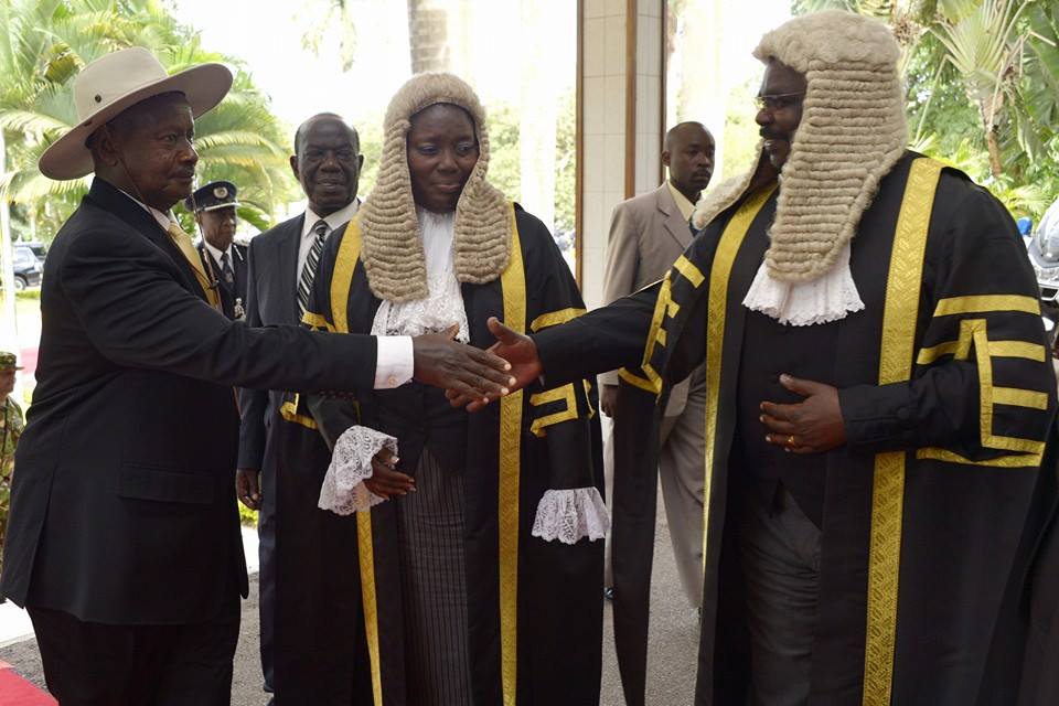 Museveni greets Oulanya and Kadaga. (File photo)