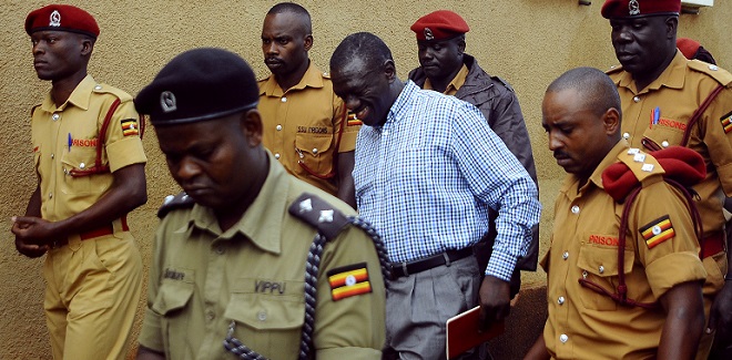 Besigye arrives at Nakawa court for an earlier hearing. The Chief Magistrate Nakawa ruled that case should be heard in court not Luzira prison. FILE PHOTO AFP