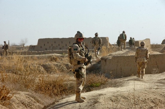 This photo obtained June 7, 2016 courtesy of National Defence / Government of Canada shows Colonel Jennie Carignan, as the commanding officer of Task Force Kandahar Engineer Regiment patrolling in Nakhonay, District of Panjwai, Afghanistan, in February 2010. / AFP PHOTO / National Defence / Government of Canada / Handout / TO GO WITH AFP STORY "Une Canadienne pour la première fois à la tête des troupes au combat" RESTRICTED TO EDITORIAL USE - MANDATORY CREDIT "AFP PHOTO / National Defence / Government of Canada " - NO MARKETING NO ADVERTISING CAMPAIGNS - DISTRIBUTED AS A SERVICE TO CLIENTS  /
