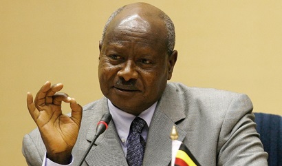 Ugandan President Yoweri Kaguta Museveni gestures as he addresses delegates during the first India-Africa Forum Summit in New Delhi on April 9, 2008. India sought to deepen strategic and economic ties with resource-rich Africa as it held its first summit meeting with African leaders and sweetened the pot by offering financial help.Indian Premier Manmohan Singh, playing host to the presidents of five African states and senior leaders of nine other countries, announced export tariffs cuts that he said would benefit 34 of Africa's 53 countries. AFP PHOTO/Findlay KEMBER