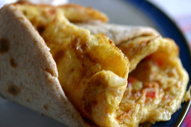 The Rolex, a rolled chapatti containing a fried egg and vegetables, is wildly popular in Uganda