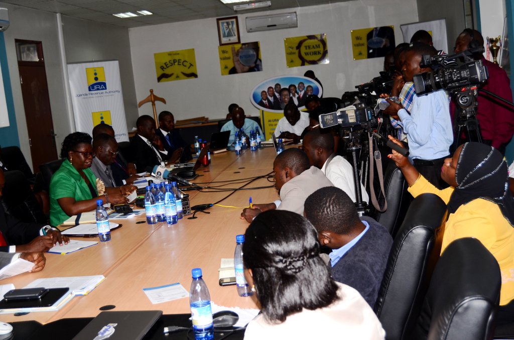 Doris Akol shares URA revenue figures with the press. PHOTO URA