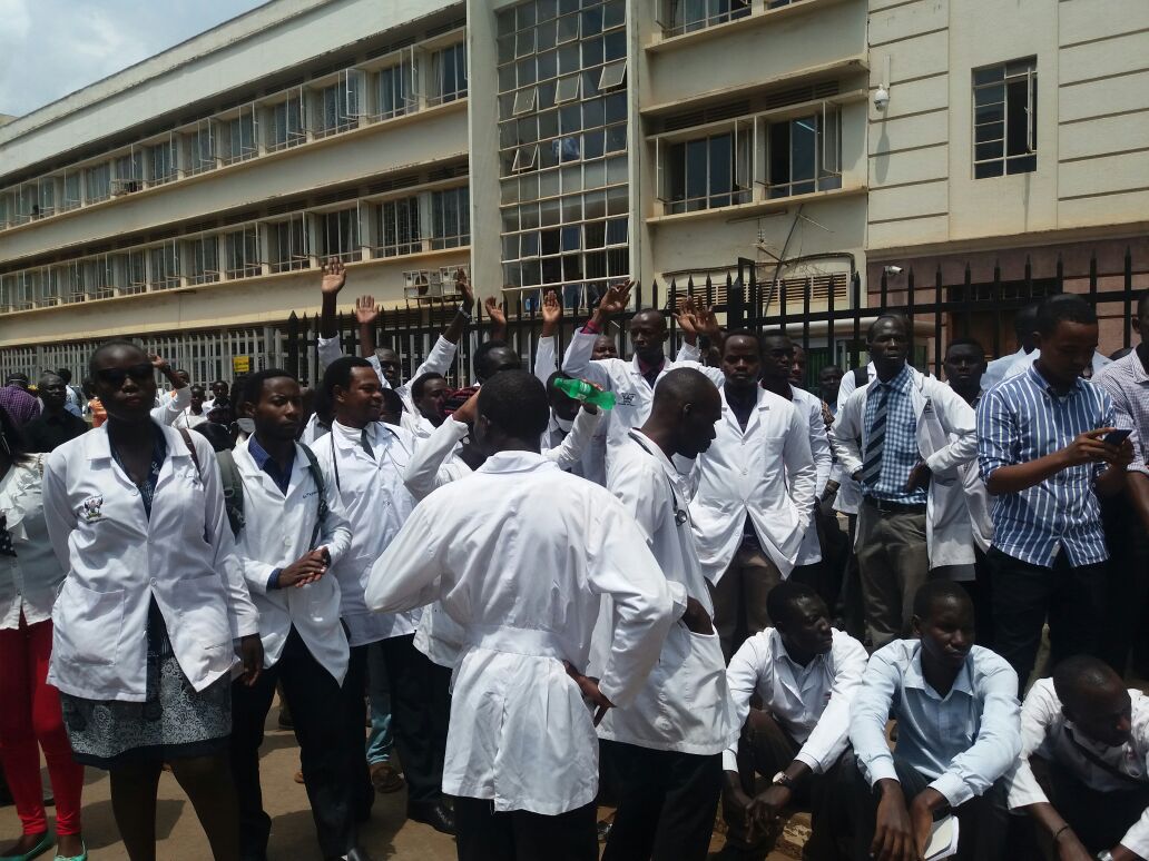 Interns outside parliament. They were stopped from moving in. PHOTOS GODFREY SSAILI 