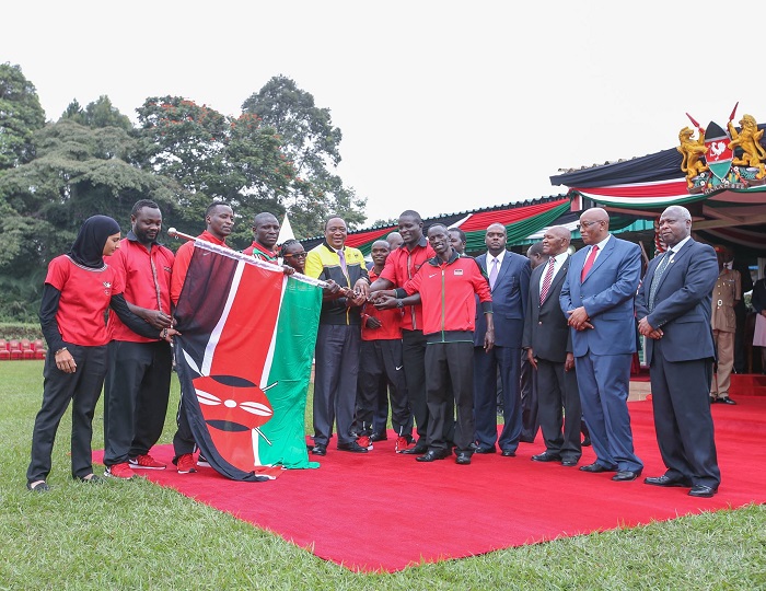 Kenyatta sends off the Olympics team. A kit scandal has hit the team after the games.