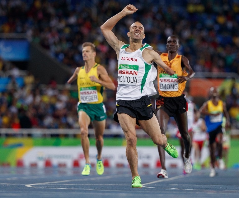 Samir Nouioua of Algeria wins the gold medal in the men's 1500m - T46 final in the Olympic Stadium during the Paralympic Games in Rio de Janeiro, Brazil on September 16, 2016. Photo by Simon Bruty/OIS/IOC via AFP. RESTRICTED TO EDITORIAL USE. / AFP PHOTO / Simon Bruty for OIS