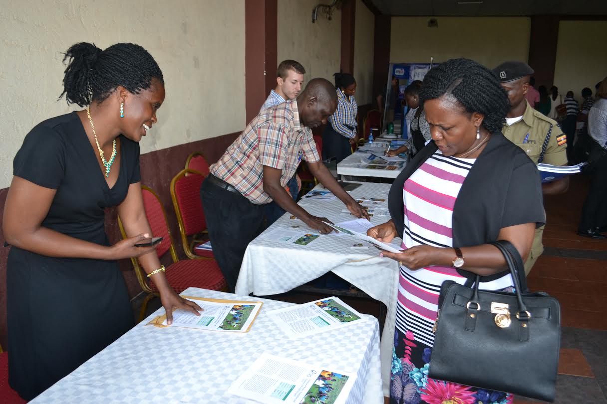 Minister Kitutu tours the WASH CSO Exhibition stalls