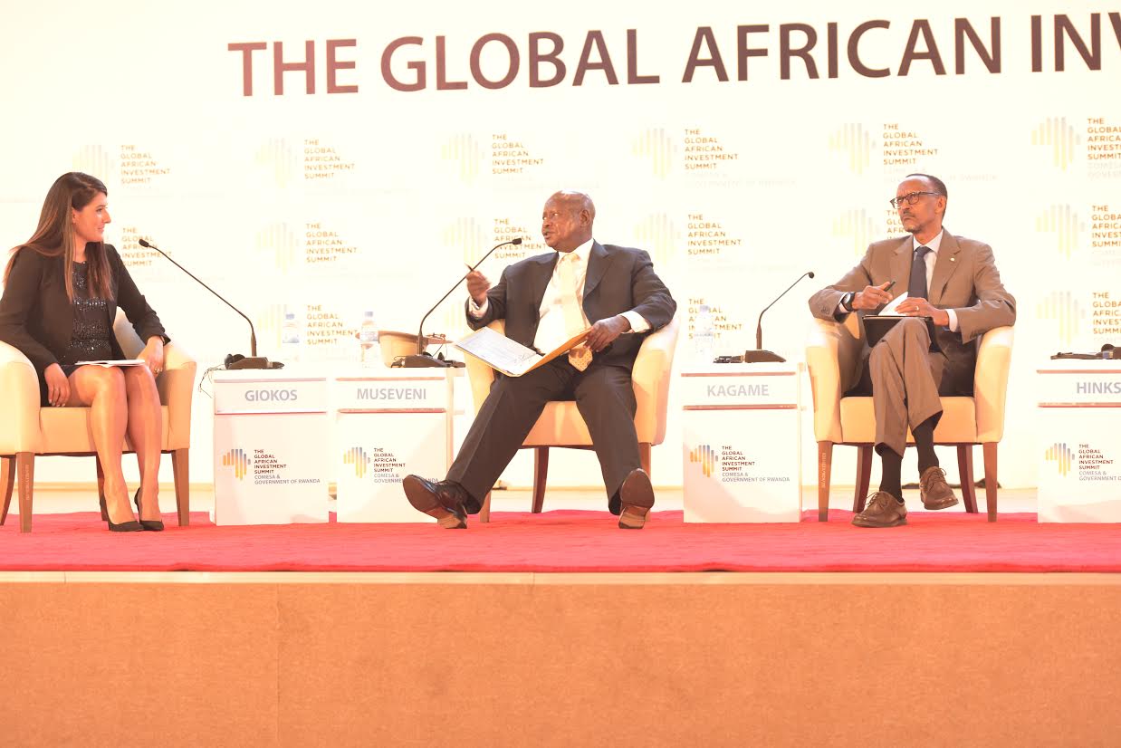 Museveni (centre) gives his views during an interactive session in Kigali on Monday. Kagame (right) also participated. PHOTO PPU