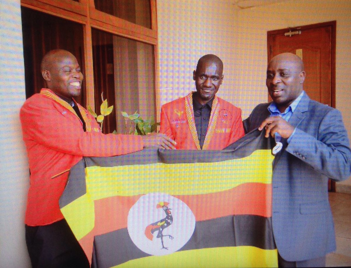 NCS Gen Sec Nicholas Muramagi (right) sees off Uganda's Paralympic team early this month.