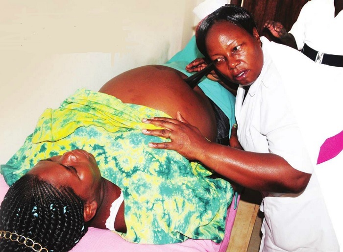 A woman undergoes check up. While many women enroll for Antenental care, 67% of mothers donot receive post natal care. INDEPENDENT/FILE PHOTO