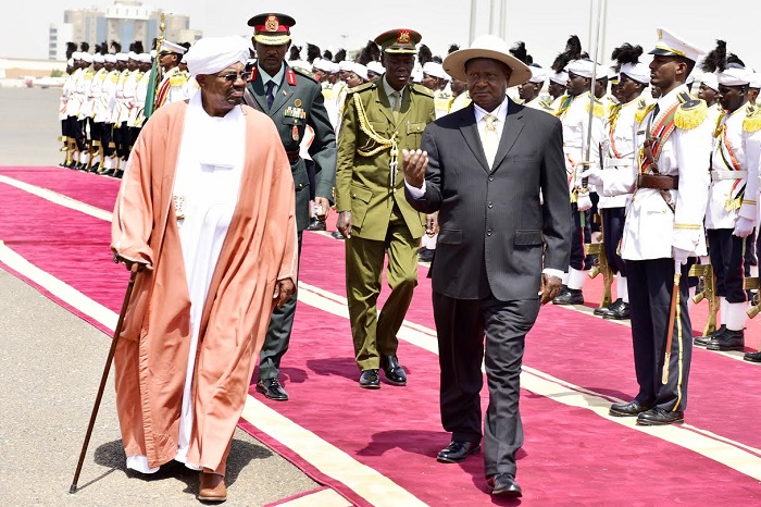 Bashir and Museveni soon after he arrived in Khartoum. PHOTO PPU