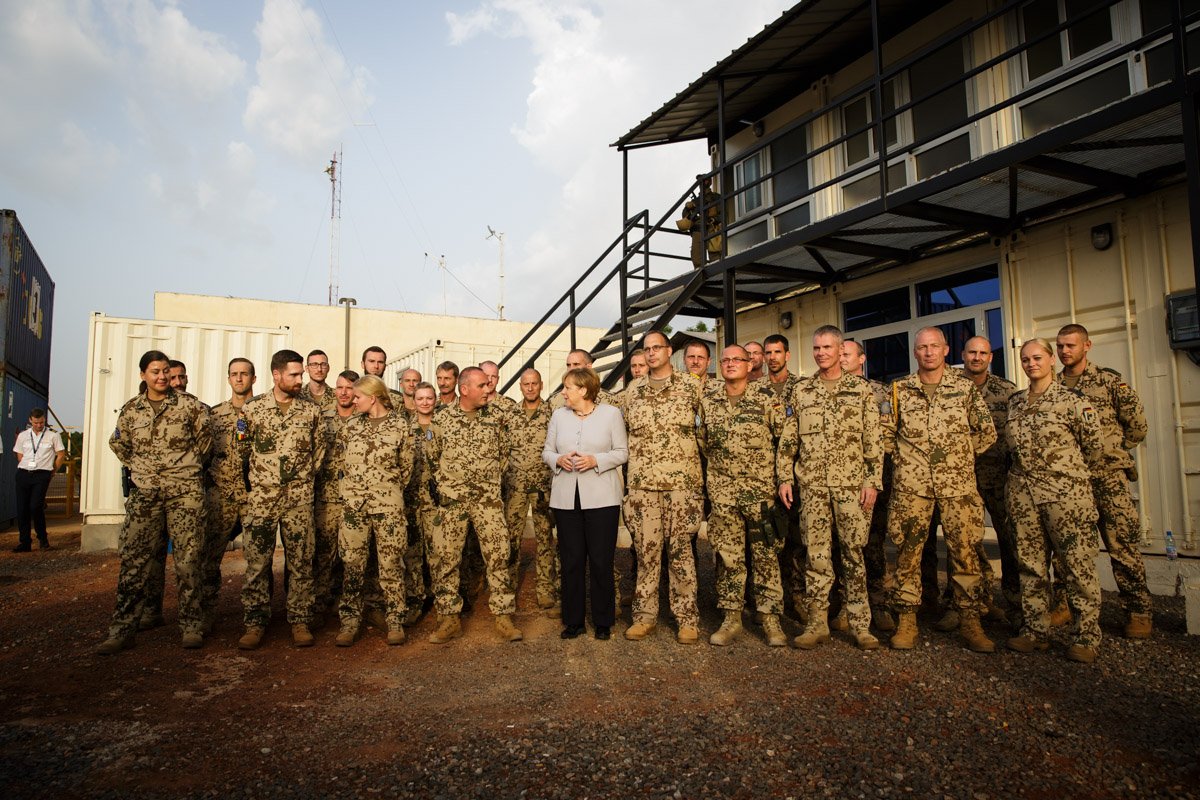 Merkel visits troops  in Mali. A blast has killed a French soldier