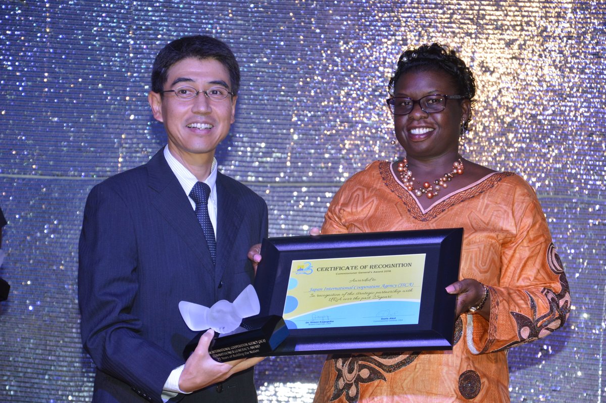 URA Commissioner General Doris Akol hands JICA their award