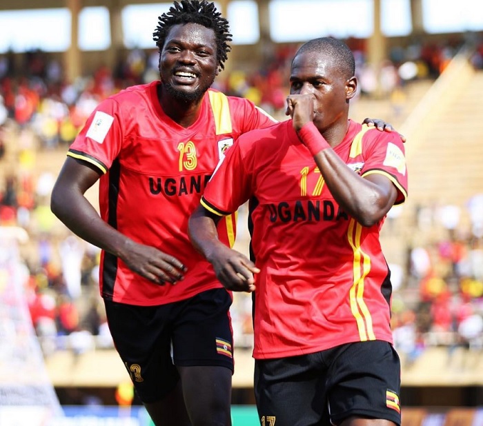 CELEBRATIONS: Oloya (left) joins goal scorer Miya. PHOTO KCCAUG