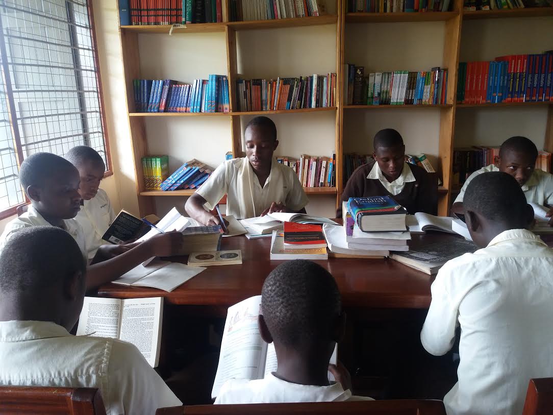 Some of the students in the community library constructed by Nyaka