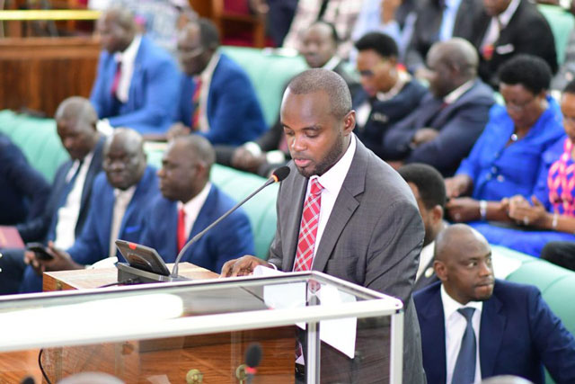 Mpaka reads out his report. PHOTO PARLIAMENT MEDIA