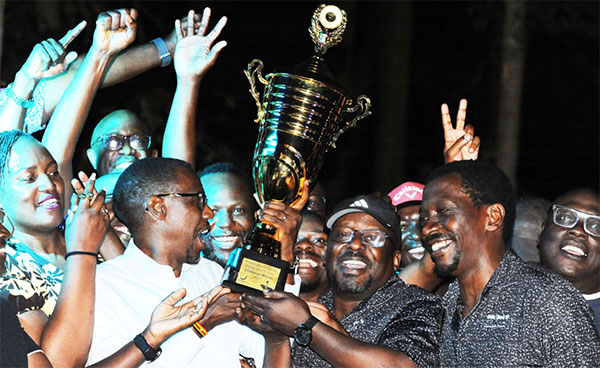 Katogo team players celebrate with trophy after beat Well Out on Saturday at Ebb Club